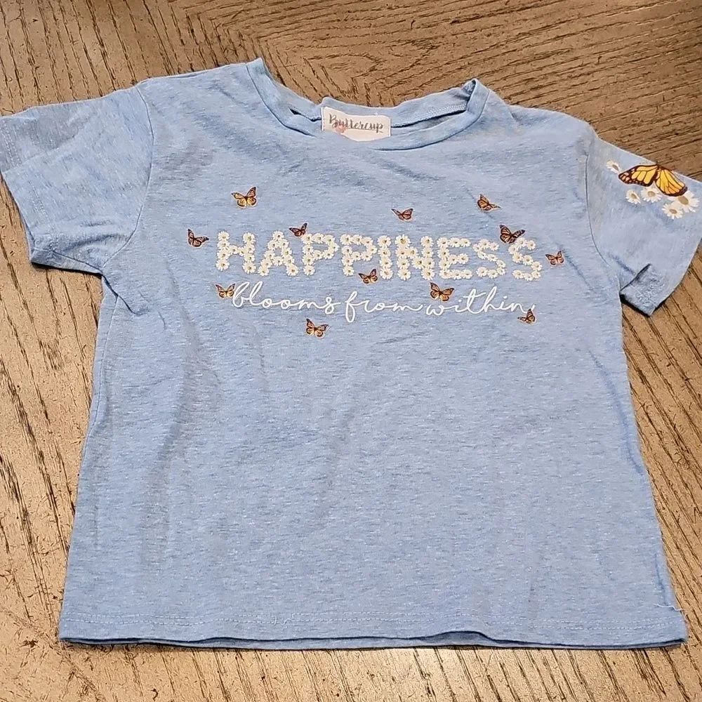 Happiness blooms from within the shirt 7/8 girls